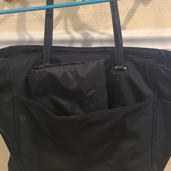 Kate spade diaper bag, black, used. W changing pad and lots...